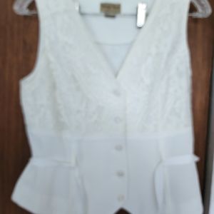 Ivory top goes with slacks to match.